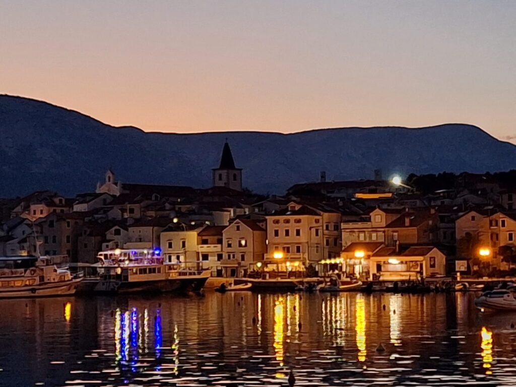 Baška harbour lights at dusk